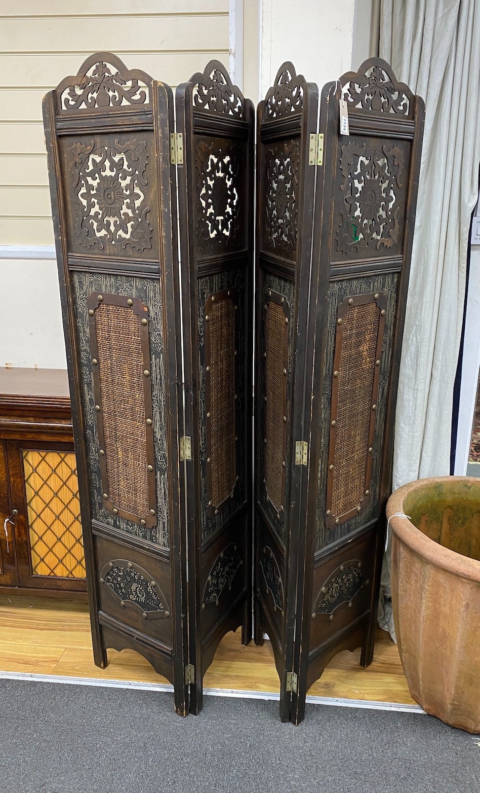 A Chinoiserie stained beech four fold screen, height 180cm, width 160cm